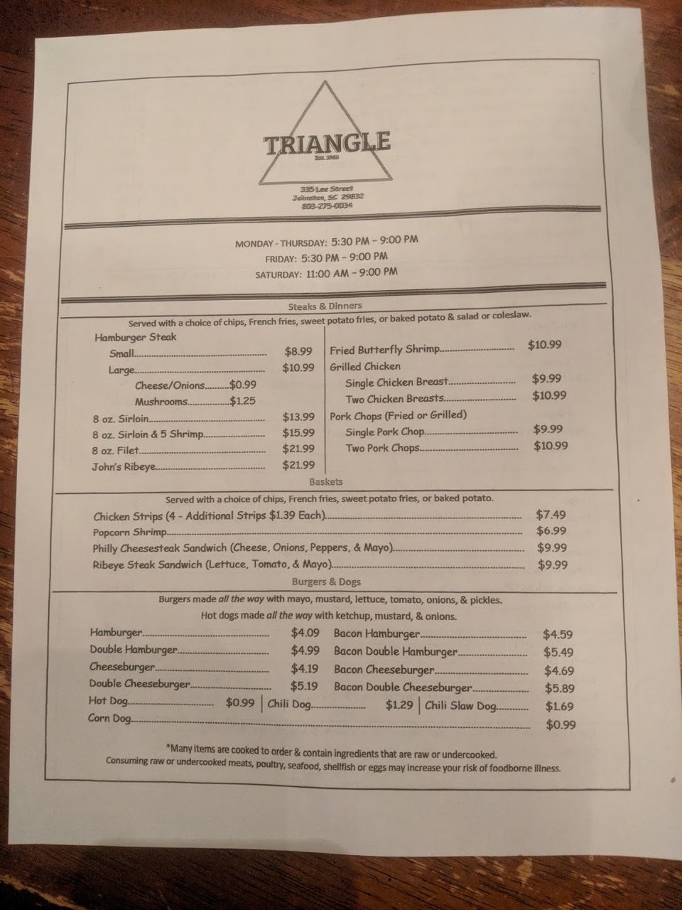 Restaurant menu featuring salads and fried sides.